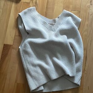 Super stylish sweater vest! Only worn once and perfect condition.